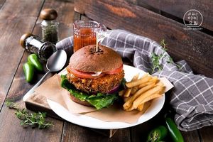 Our new vegan burger! Jalapeno Burger with Spicy Sauce! All sauce is made in-house by our chef! Delicious burger filled with flavors! at yummyyomil in Seoul
