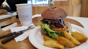 The barbecue burger! It came with fries, ketchup, and a fruit juice/tea for 7,800 won. I left happy and full. at yummyyomil in Seoul