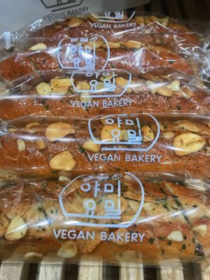 My favorite: garlic bread. Soft, chewy, sweet, garlicy. This place is perfect for buying some snacks for on the way.  at yummyyomil in Seoul