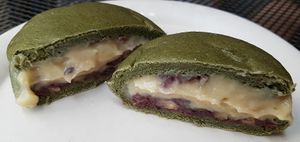 Sweet bun (mugwort flavor) filled with cream and red bean paste.
 at yummyyomil in Seoul