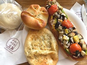 Savoury pastries and a delicious sweet custard bun! at yummyyomil in Seoul