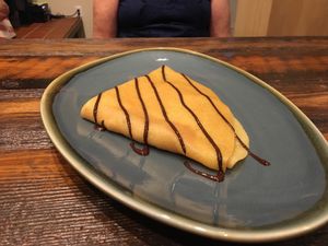 Peanut butter and banana crepe with chocolate sauce at Kind Crepes in Mendon