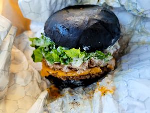 I tried the double cheese burger with sauce/spread on the side and to add onions. Unfortunately they didn't do either. Didn't care for whatever the sauce at all. Too much and very  at Pirate's Bone Burgers - Crossroads in Kansas City