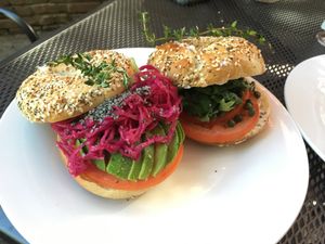 Avocado bagel sandwich and cream cheese & tomato & caper sandwich. So good! at Pirate's Bone Burgers - Crossroads in Kansas City
