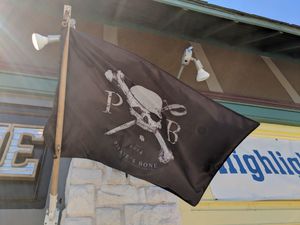 Flags out front at Pirate's Bone Burgers - Crossroads in Kansas City