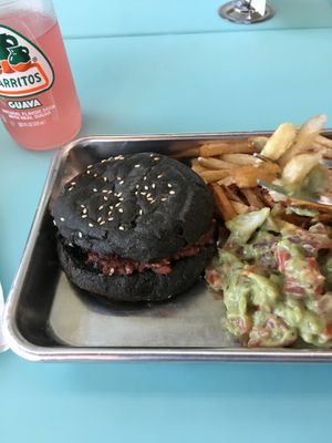 Beyond burger with guacamole and fries.  at Pirate's Bone Burgers - Crossroads in Kansas City