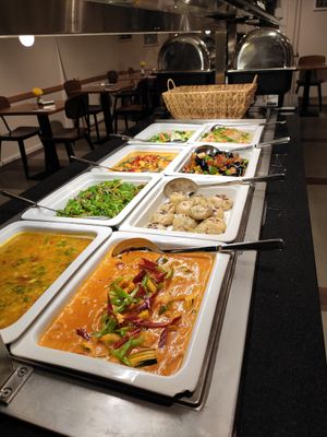Hot food section of the buffet (with a basket of special bread in the back and metal containers with fantastic dumplings in it) at Chimy's in Zurich