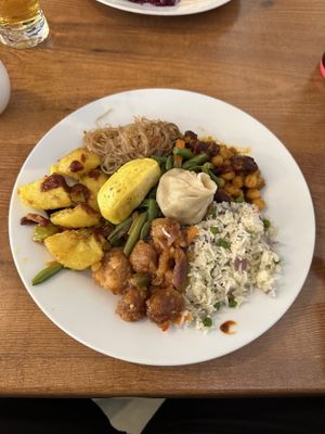 All you can eat buffet! Our first of five plates we ate!  at Chimy's in Zurich