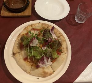 Yum pizza! Vegan pizza is labelled as an option at bottom of the menu. Also got the fried mushrooms which were delish. A random vibe at restaurant but didn’t matter!  at La Luce in Fujikawaguchiko