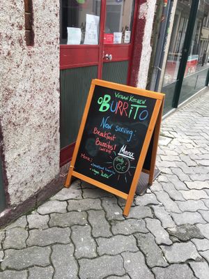 Board outside  at O Burrito in Porto