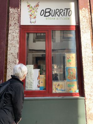 Checking out the menu at O Burrito in Porto