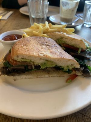 Vegan Delight - sauerkraut, avo, tomato, mushroom and spinach on Turkish bread with a side of fries. Could’ve used some vegan mayo or aioli but was fine for the price.   at Saff's Cafe  in Castlemaine