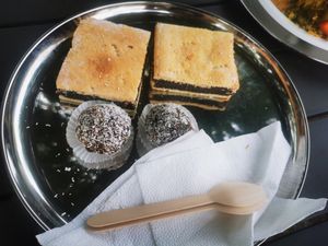 Coconut ball and poppy seed cake at Govinda Csillaghegy in Budapest