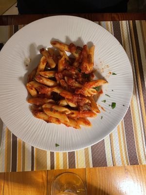 Tomato sauce I think. Also undercooked pasta   at Coogi's Restaurant in Mdina