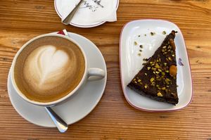 Oat cappuccino with choco nut cake   at Coogi's Restaurant in Mdina