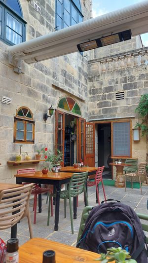 Sitting outside at Coogi's Restaurant in Mdina