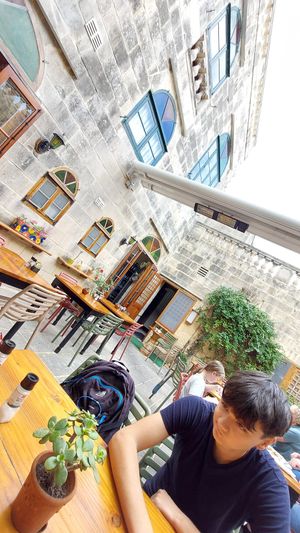 Sitting outside at Coogi's Restaurant in Mdina