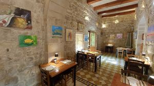 Sitting inside at Coogi's Restaurant in Mdina