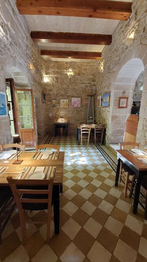Sitting inside at Coogi's Restaurant in Mdina