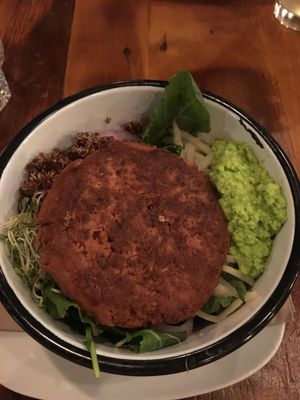 beyond meat burger on a salad at Bareburger in Astoria