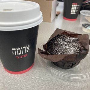 Vegan muffin and cappuccino with oat milk  at TLV - Aroma - T3 in Tel Aviv