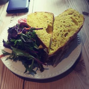 Vegan sandwich with turmeric and onion seeds at Charlie's in Tintagel