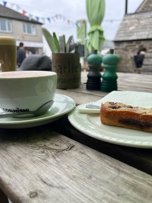 Stopped for coffee and cake, they had a lovely vegan blueberry Bakewell. Dog friendly too which was a bonus    at Charlie's in Tintagel