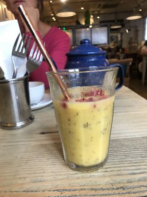 Delicious tropical smoothie 🍌🍍🥥 at Bill's in Guildford