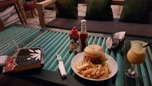 Vegetarian falafel burger and vegan mango-coconut milkshake. at Chookie's Beer Garden in Ninh Binh