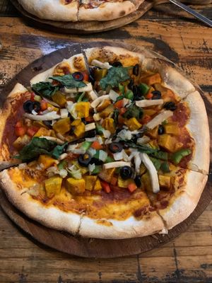 Vegan supreme pizza (pumpkin, mushrooms, bellpepper, onion, spinach, olives) at Chookie's Beer Garden in Ninh Binh