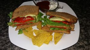 Vegan sandwich, with a vegan mayonnaise on the side at Carmita's Pancake House Restaurant in Montanita