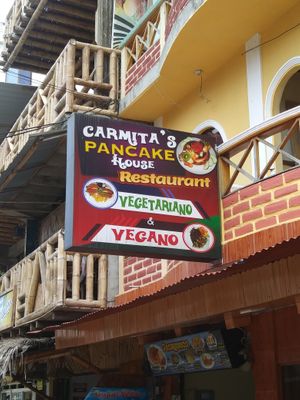 Sign outside of restaurant at Carmita's Pancake House Restaurant in Montanita