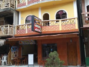 View of restaurant from street at Carmita's Pancake House Restaurant in Montanita