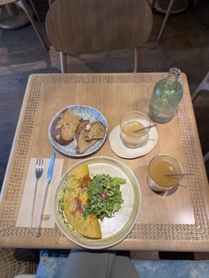 Chickpea-omelette filled with sauteed tamari-mushrooms and cherry tomatoes - and ordered bread on the side - super yum   at My Mother's Daughters  in Lisbon
