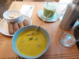 Delicious soup of the day but small portion. Falafel croquettes and unsweetened matcha. Not pictured - unsweetened banana bread. at My Mother's Daughters  in Lisbon