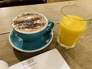 Chocolate milk (oat) and Orange juice at Partisan in York