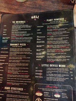 One side of the menu at Hell Pizza in Auckland