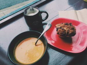 soup of the day with a yummy choco blueberry muffin guzzled down with some foamy chai tea :)  at Karma Road Organic Cafe in New Paltz