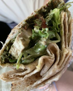 Baked Tofu Wrap - my husband and I really enjoyed these between parades on the 4th of July! 🇺🇸  at Karma Road Organic Cafe in New Paltz