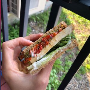 Baked tofu, pesto, and red pepper sandwich at Karma Road Organic Cafe in New Paltz