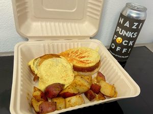 eggs benedict + breakfast potatoes + beer (takeout) at Georgetown Liquor Company in Seattle