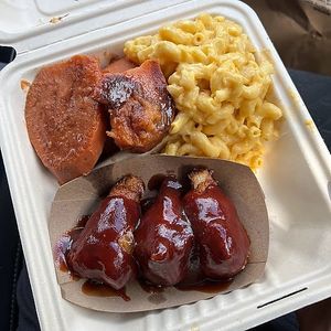 drumstick plate w mac and candied yams at Vegan International Co in Tampa