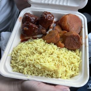 sweet n spicy drumsticks, candied yams, saffron rice   at Vegan International Co in Tampa