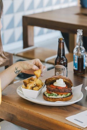 The Black Bean burger: Hand made blackbean patty, roast red pepper and cream cheese. at Bacoa - Ferran in Barcelona