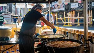 Cooking the dishes each morning, we start at 4am! at The Tempeh Man - Food Stall in London