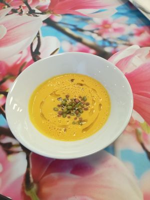 raw vegan ginger carrot soup with sprouts at bistRAWveg - Cerny Most Shopping Centre in Prague