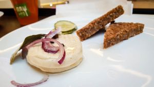 RAWmelin with pickled cucumber and bread at bistRAWveg - Chodov Shopping Center in Prague
