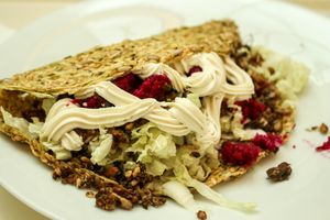 zucchini pancake with cabbage and cashew cream at bistRAWveg - Chodov Shopping Center in Prague