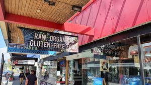 Street sign....the cafe is down in a small alley mall. at Power Plant Organic Store in Whangarei