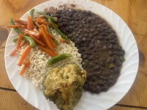 Rice, black beans, mixed vegetables and a breaded broccoli floret   at Ananda - Calle Hermano Miguel in Cuenca
